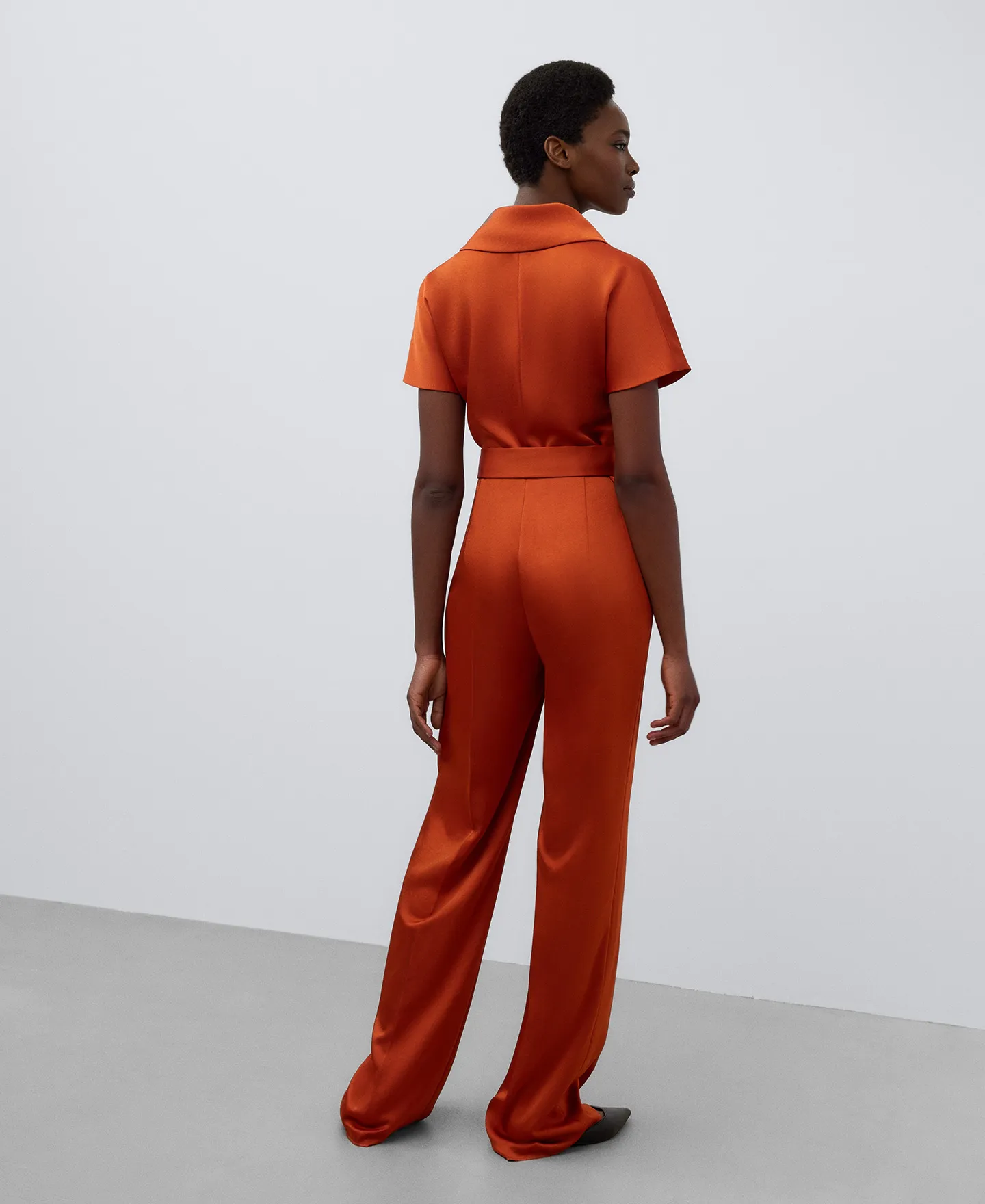 Orange jumpsuit woman