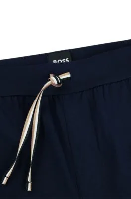 Pantalones de pijama en algodón elástico con logo estampado