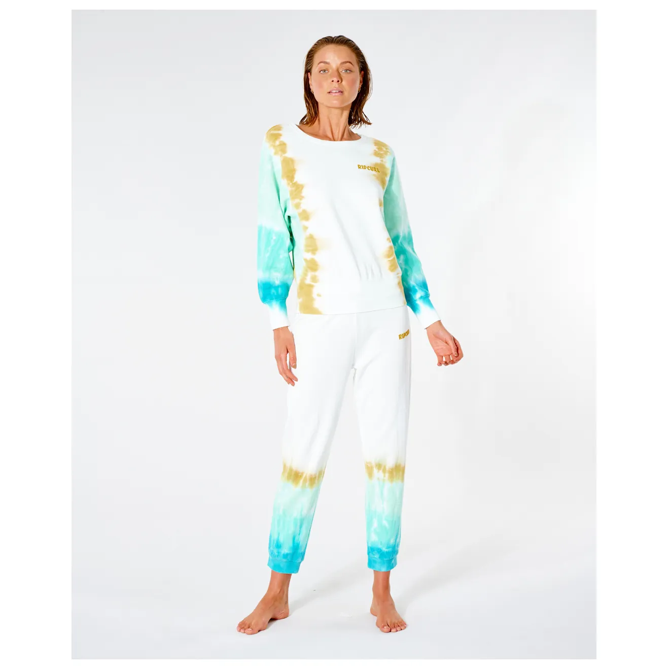 Pantalón de Chándal RIP CURL deporte para mujer sun drenched trackpant  GPACI9 0074_L_122 color turquoise y amarillo