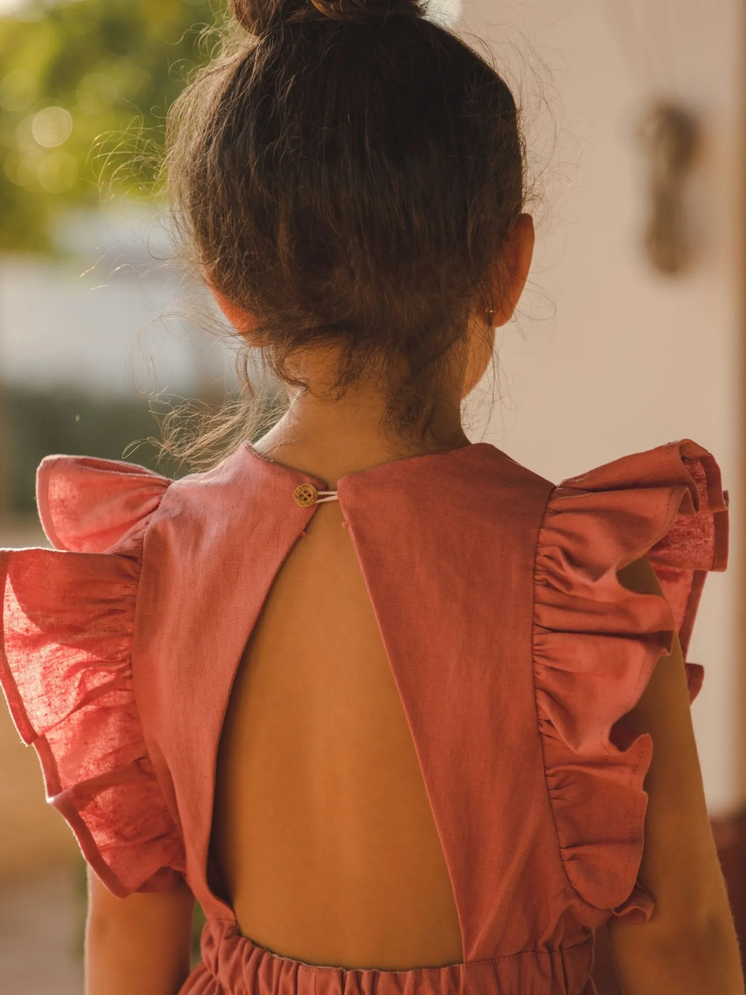 Terracotta linen jumpsuit for girl by José Varón