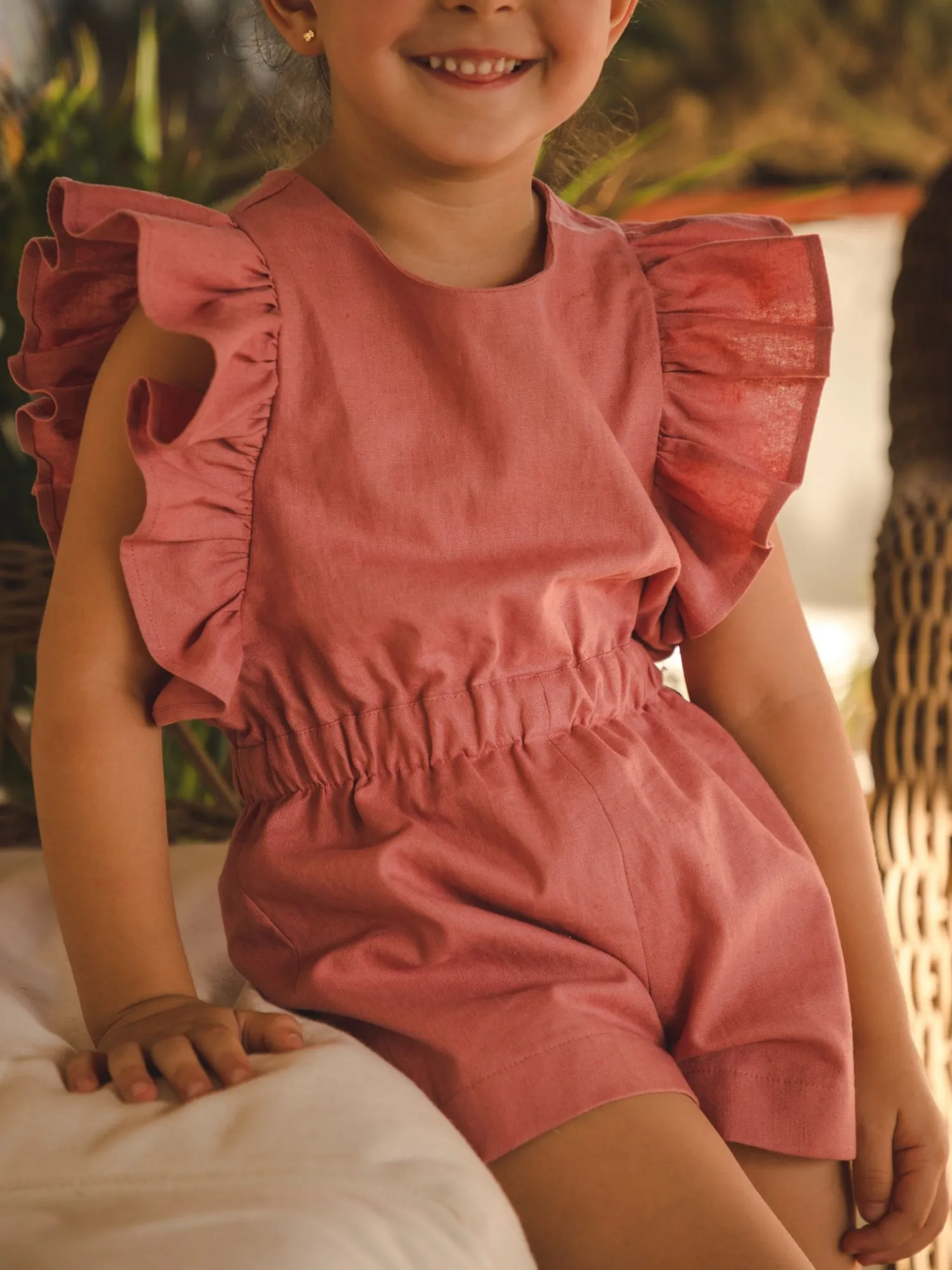 Terracotta linen jumpsuit for girl by José Varón