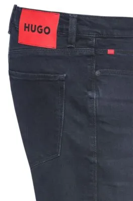 Vaqueros extra slim fit de denim elástico negro azulado