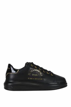 Zapatillas negras con logo rue st guillaume dorado en metal